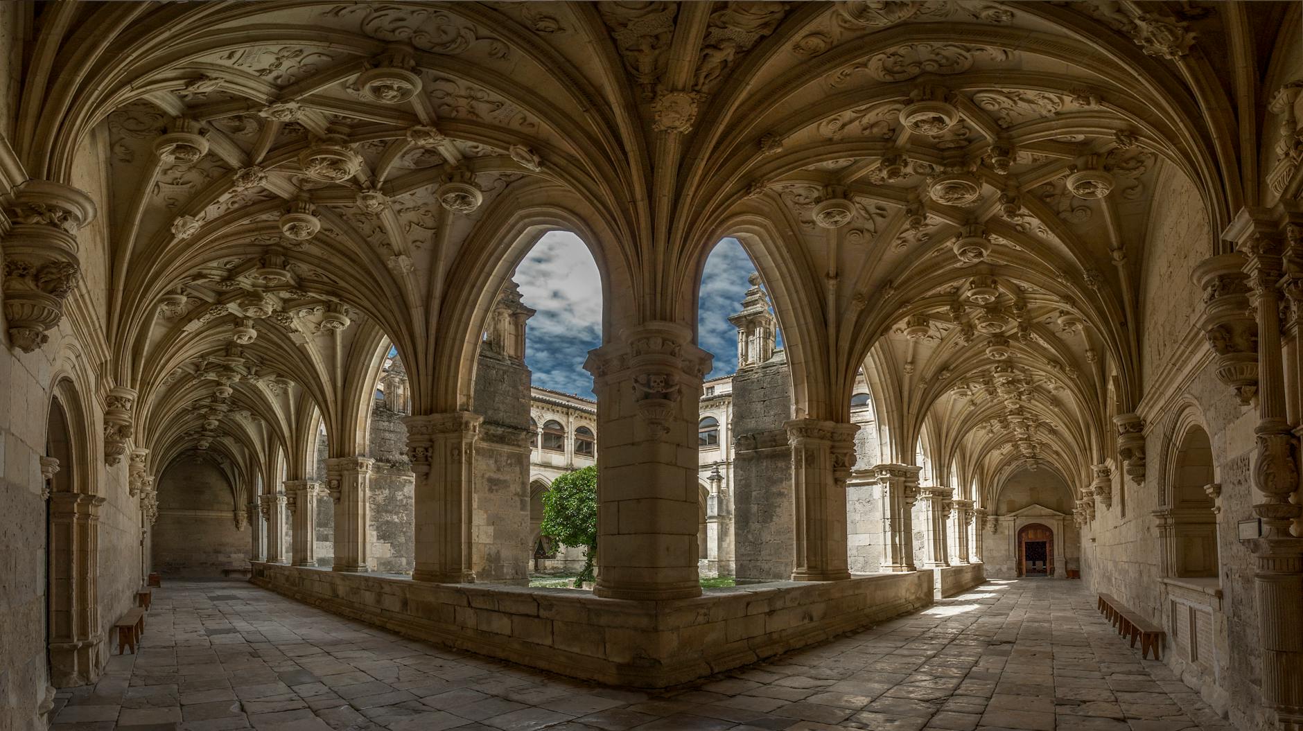 Intricate architectural design of the cloisters at Monasterio de San Zoilo, Palencia, Spain.