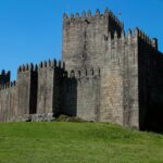 Explore the historic Guimarães Castle, a stunning example of medieval architecture in Portugal.