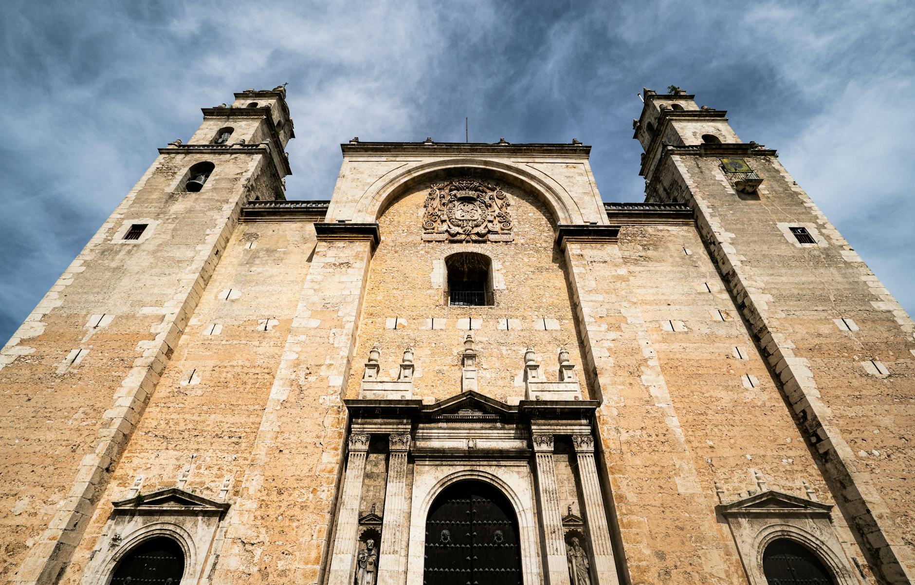 Low angle view of the historic cathedral in Mérida, showcasing its stunning architecture.