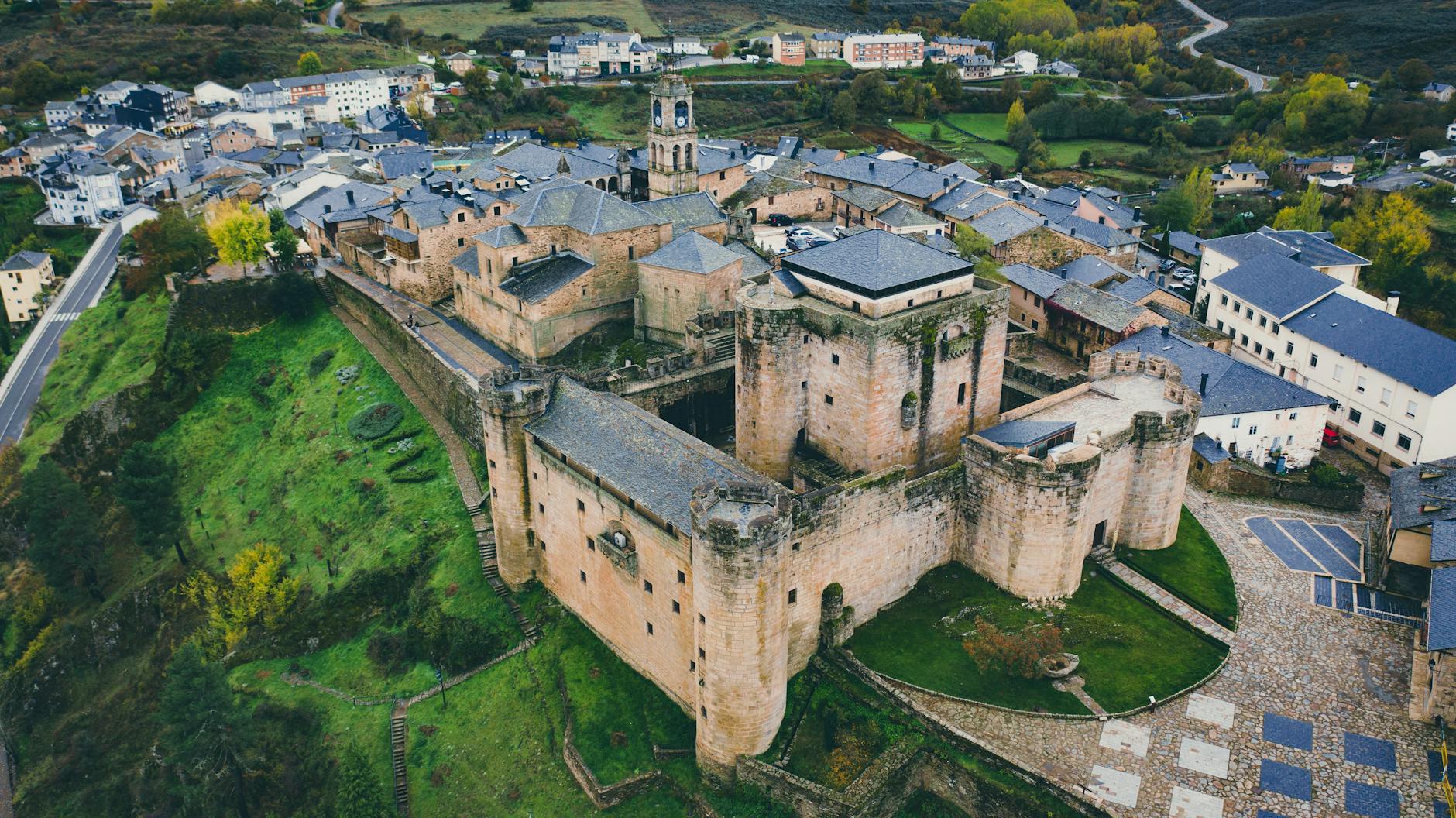 A stunning aerial view of the historic Puebla de Sanabria Castillo in Castilla y León, Spain.