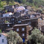 Explore the historic charm of Piódão village with its unique stone architecture nestled in Portugal's scenic mountains.