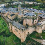 A stunning aerial view of the historic Puebla de Sanabria Castillo in Castilla y León, Spain.
