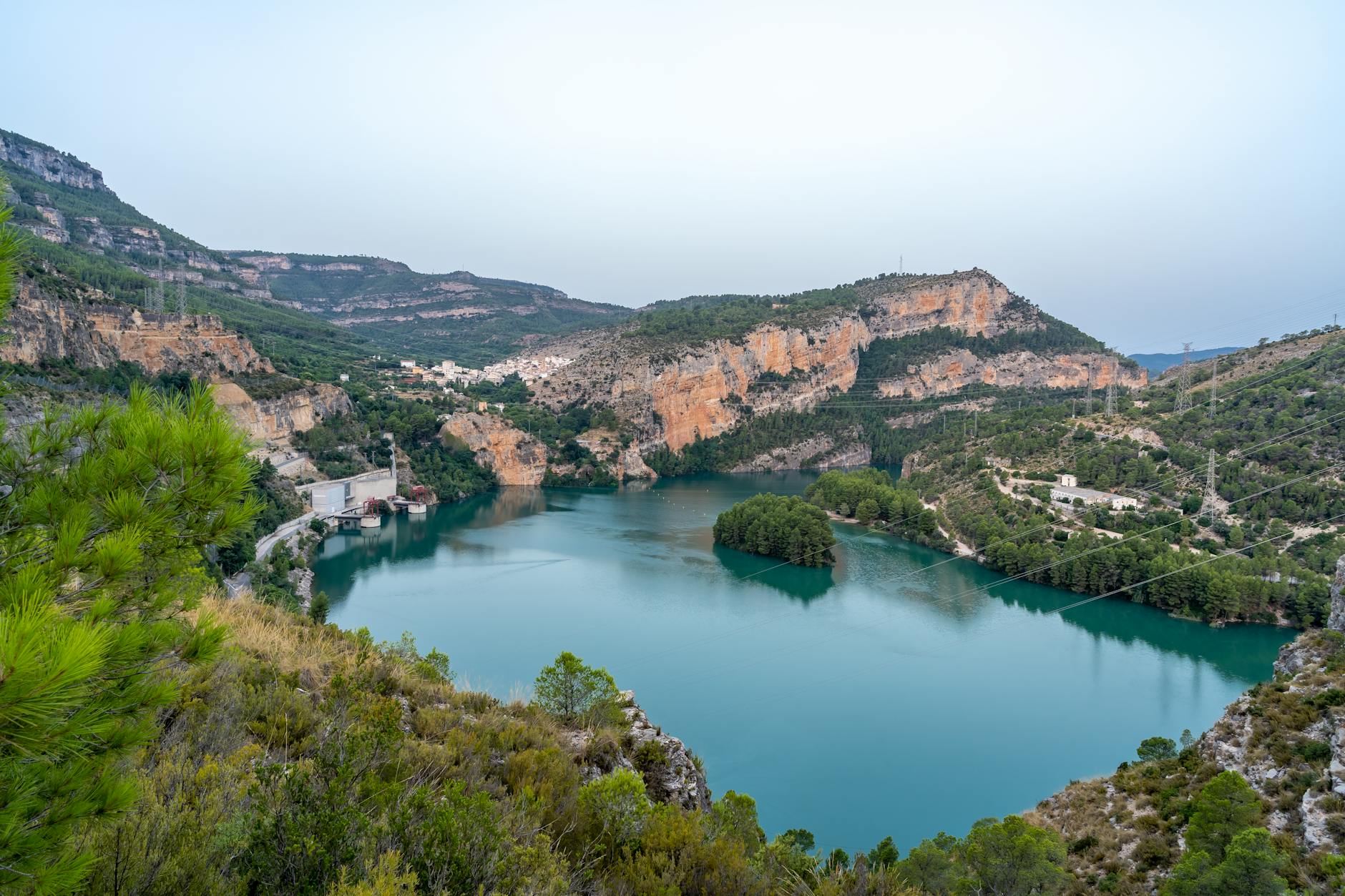 Stunning landscape of turquoise lake and cliffs in Cortes de Pallás, Spain.