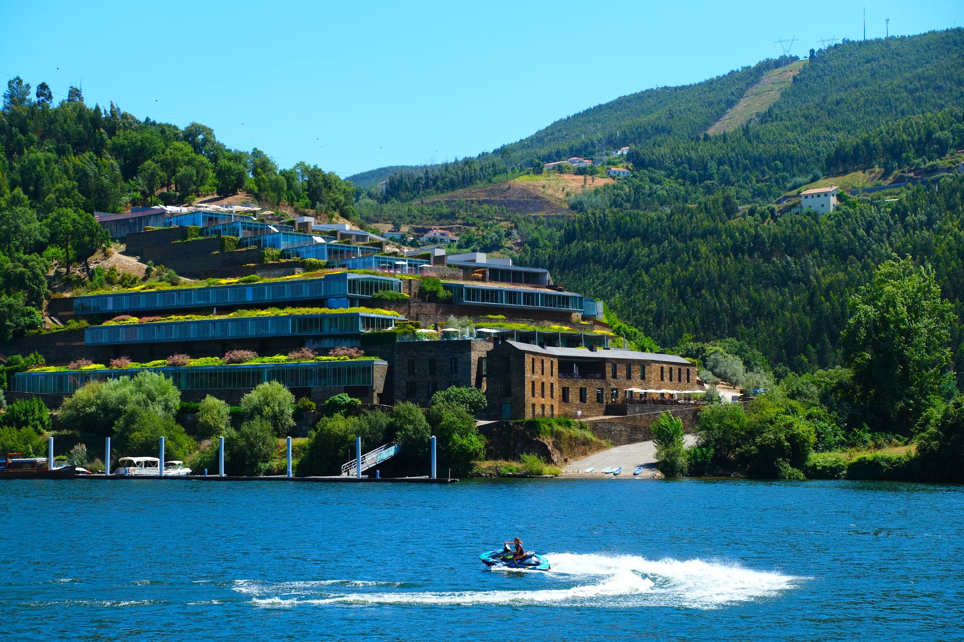 Enjoy a picturesque view of a luxury resort by the Rio Douro in Braga, Portugal.