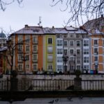 Charming colorful buildings along a river in Burgos, Spain.