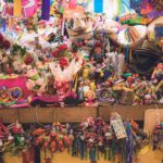 Colorful market stall packed with traditional toys and crafts in Guanajuato, Mexico.