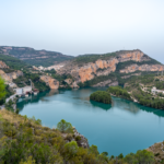 Stunning landscape of turquoise lake and cliffs in Cortes de Pallás, Spain.