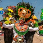 Colorful and ornate costume performer at Barranquilla Carnival, showcasing Colombian culture.