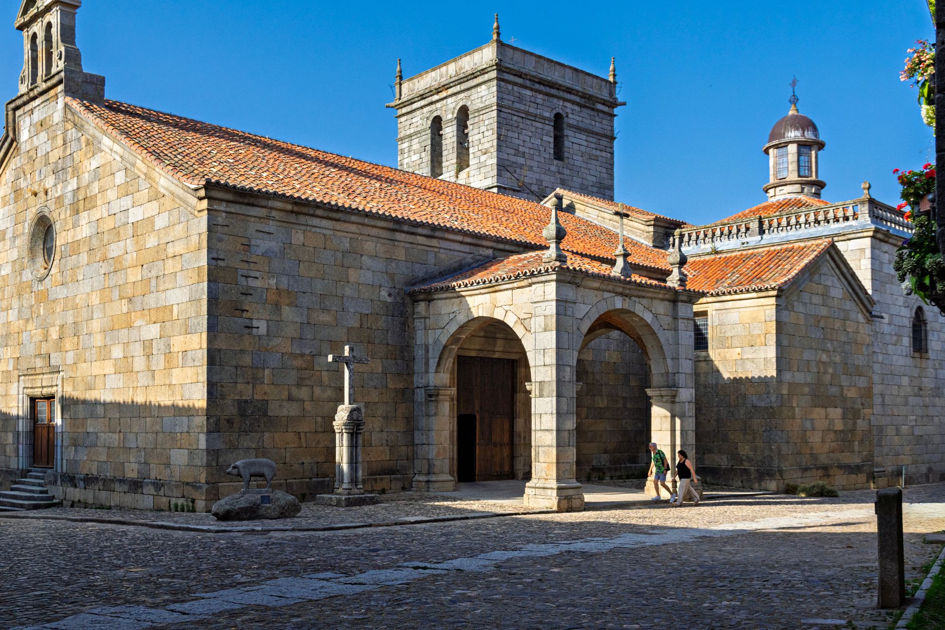 Beautiful stone church bathed in sunlight in La Alberca, Spain.